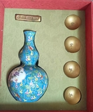 粉彩葫芦瓶与金条